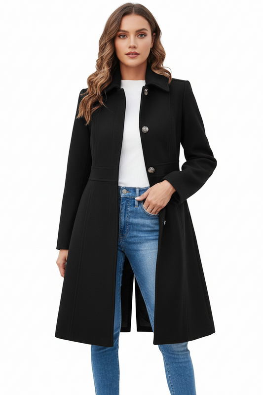 Woman wearing a black coat over a white shirt and blue jeans on a white background