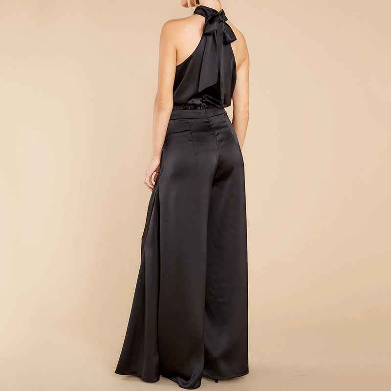 one-piece jumpsuit blends modern minimalism with retro flair, featuring an off-the-shoulder neckline