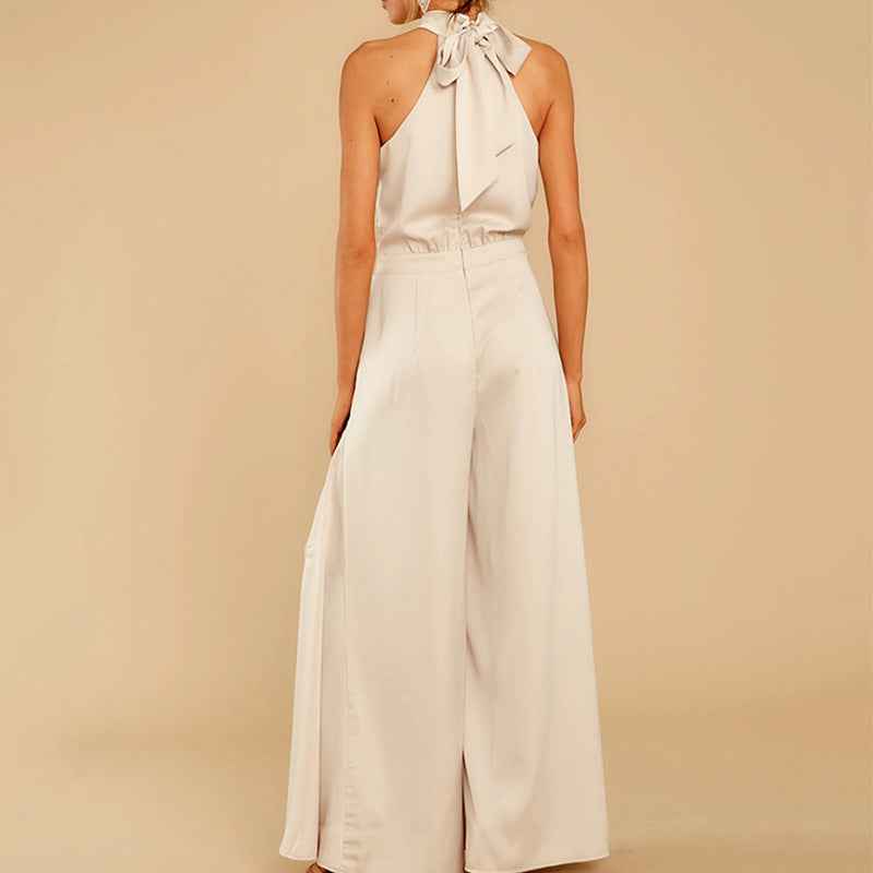 one-piece jumpsuit blends modern minimalism with retro flair, featuring an off-the-shoulder neckline