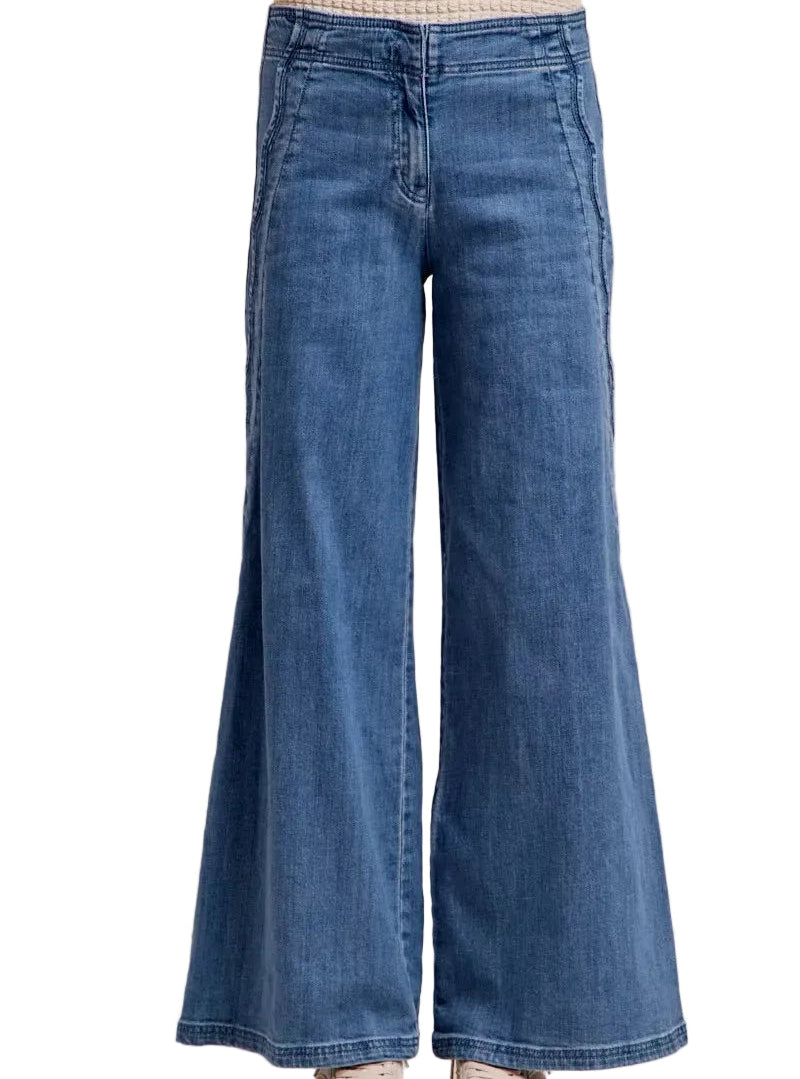 Blue wide-leg jeans on a white background
