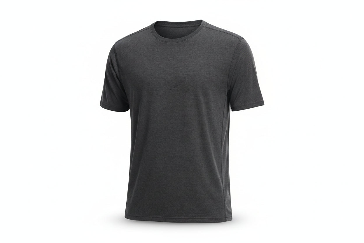 Person wearing a plain dark gray t-shirt on a light gray background