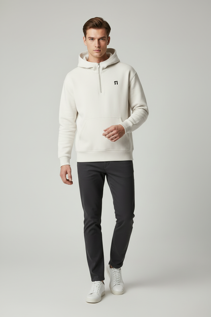 Same model in dynamic pose wearing white Stonehenge hoodie